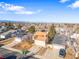 Aerial view of house and surrounding area with mountain view at 19136 E Milan Cir, Aurora, CO 80013