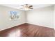 Bright bedroom with hardwood floors and ceiling fan at 19136 E Milan Cir, Aurora, CO 80013