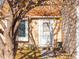 House's front entrance with white door and landscaping at 19136 E Milan Cir, Aurora, CO 80013