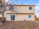 Two-story house with backyard and sliding glass door at 19136 E Milan Cir, Aurora, CO 80013