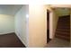 Partially finished basement, with stairs, features updated flooring and ample space at 1409 S Clermont St, Denver, CO 80222