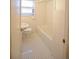 Classic white bathroom with a clean, minimalist design and tile flooring at 1409 S Clermont St, Denver, CO 80222