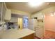 Efficient kitchen with white appliances and plenty of counter space at 1409 S Clermont St, Denver, CO 80222