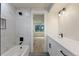 Contemporary bathroom with stylish tile, a shower, and double vanity at 3711 Pecos St, Denver, CO 80211