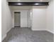 Carpeted bedroom with closet and modern lighting at 3711 Pecos St, Denver, CO 80211