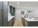 Contemporary kitchen with sleek cabinets, stainless steel appliances, and a bright, open layout at 3711 Pecos St, Denver, CO 80211