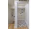 Well-lit laundry room with tiled floors and utility hookups at 3711 Pecos St, Denver, CO 80211