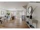 Spacious living room featuring hardwood floors, modern decor, and ample natural light at 3711 Pecos St, Denver, CO 80211