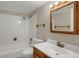 Bathroom featuring a shower-tub combination, toilet and vanity at 2485 S Xanadu Way # D, Aurora, CO 80014