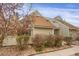 A cozy home showcasing well-maintained landscaping and a charming exterior at 2485 S Xanadu Way # D, Aurora, CO 80014