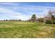 A picturesque view of the community golf course on a sunny day at 2485 S Xanadu Way # D, Aurora, CO 80014