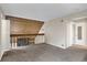 The loft provides extra storage, a wooden wall and railing, and neutral carpet flooring at 2485 S Xanadu Way # D, Aurora, CO 80014