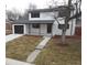 Stunning two-story home with a modern exterior and landscaped yard at 6148 Nelson St, Arvada, CO 80004