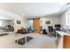 Bright and open basement with flexible space and a barn door at 10395 W 74Th Pl, Arvada, CO 80005