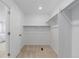 Walk-in closet with rod and shelf, offering ample storage, and a clean, bright space for organizing belongings at 13446 Amber Sky St, Parker, CO 80134