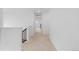 Upstairs hallway with plush carpeting leads to bedrooms and other living spaces at 13446 Amber Sky St, Parker, CO 80134
