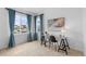 Bright office with large windows, modern desk, and neutral decor at 13446 Amber Sky St, Parker, CO 80134