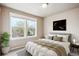 Inviting bedroom filled with natural light features a comfortable bed and stylish decor at 1095 W 69Th Ave, Denver, CO 80221