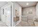 Bright hallway boasts neutral tones, modern fixtures, and leads to other areas of the home at 1095 W 69Th Ave, Denver, CO 80221