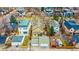 Aerial view of a home with backyard, garage, and surrounding neighborhood at 519 S Gaylord St, Denver, CO 80209