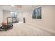 Finished basement with exercise equipment and natural light at 519 S Gaylord St, Denver, CO 80209