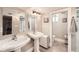 Bathroom with double sinks, and walk in shower at 519 S Gaylord St, Denver, CO 80209