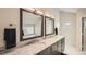 Luxurious bathroom with dual sinks, marble countertops, and modern fixtures at 519 S Gaylord St, Denver, CO 80209
