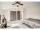Comfortable bedroom featuring a ceiling fan, and neutral decor at 519 S Gaylord St, Denver, CO 80209