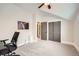 Bedroom featuring neutral tones, gray closet doors, and an adjacent doorway at 519 S Gaylord St, Denver, CO 80209