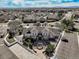 Stunning aerial view of community clubhouse surrounded by lush landscaping and ample parking at 3250 E 103Rd Pl # 805, Thornton, CO 80229