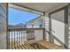 Relaxing balcony with wooden decking and views of the neighborhood at 3250 E 103Rd Pl # 805, Thornton, CO 80229