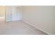 Bright bedroom with plush carpeting, closet with folding doors, and ample natural light at 3250 E 103Rd Pl # 805, Thornton, CO 80229