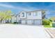 Attractive townhouse complex with individual garages and manicured grounds at 3250 E 103Rd Pl # 805, Thornton, CO 80229