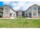 Charming condo building featuring beautiful stone accents and manicured lawn in a desirable community at 3250 E 103Rd Pl # 805, Thornton, CO 80229