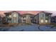 Attractive condo building featuring stone accents and pleasing architectural details under winter skies at 3250 E 103Rd Pl # 805, Thornton, CO 80229