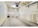 Spacious garage with unfinished drywall, providing a blank canvas for customization at 3250 E 103Rd Pl # 805, Thornton, CO 80229