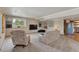 Finished basement featuring a comfortable seating area, TV and recessed lighting at 8403 Homestake Ct, Larkspur, CO 80118