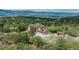 Beautiful home with solar panels nestled among the trees with stunning mountain views at 8403 Homestake Ct, Larkspur, CO 80118