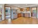 Bright kitchen with stainless steel refrigerator and wood cabinets at 8403 Homestake Ct, Larkspur, CO 80118