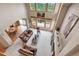 An aerial view of a spacious living room with a vaulted ceiling and expansive views of the outdoors at 8403 Homestake Ct, Larkspur, CO 80118