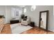 Bright and comfortable bedroom with natural light and wood flooring at 10152 Bluffmont Ln, Lone Tree, CO 80124