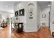 Entryway features hardwood floors and a stylish console table with decorative accents at 10152 Bluffmont Ln, Lone Tree, CO 80124