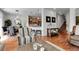 Open-concept room showcases a kitchen view, dining area, and living space at 10152 Bluffmont Ln, Lone Tree, CO 80124