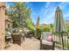 Outdoor patio seating area perfect for relaxing and entertaining guests at 10152 Bluffmont Ln, Lone Tree, CO 80124