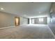 Finished basement with recessed lighting, neutral walls, plush carpeting, and access to outside at 4090 Forever Cir, Castle Rock, CO 80109