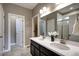 Elegant bathroom with double sinks and a large mirror at 4090 Forever Cir, Castle Rock, CO 80109