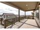 The covered back deck is the perfect place to relax and enjoy the Colorado scenery at 4090 Forever Cir, Castle Rock, CO 80109