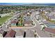 Wide aerial view of the suburban neighborhood with scenic mountain views in the background at 4090 Forever Cir, Castle Rock, CO 80109