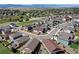 Expansive aerial view showcasing the neighborhood's layout, homes and mountain views at 4090 Forever Cir, Castle Rock, CO 80109