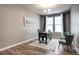 Bright and spacious office featuring wood flooring and natural light, ideal for remote work or study at 4090 Forever Cir, Castle Rock, CO 80109
